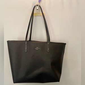 Black Reversible Coach Tote bag. Cherry graffiti detail.